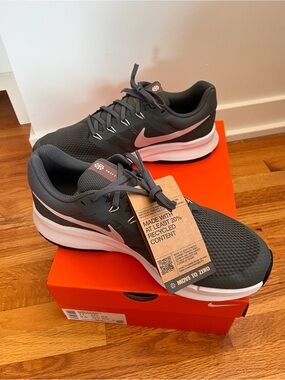Nike women’s Athletic Running Shoes in Dark Gray and Pink